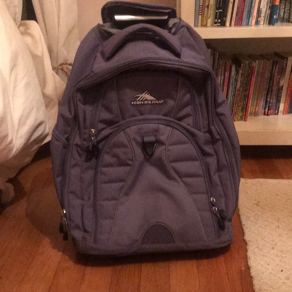 High Sierra lavender/light purple rolling backpack